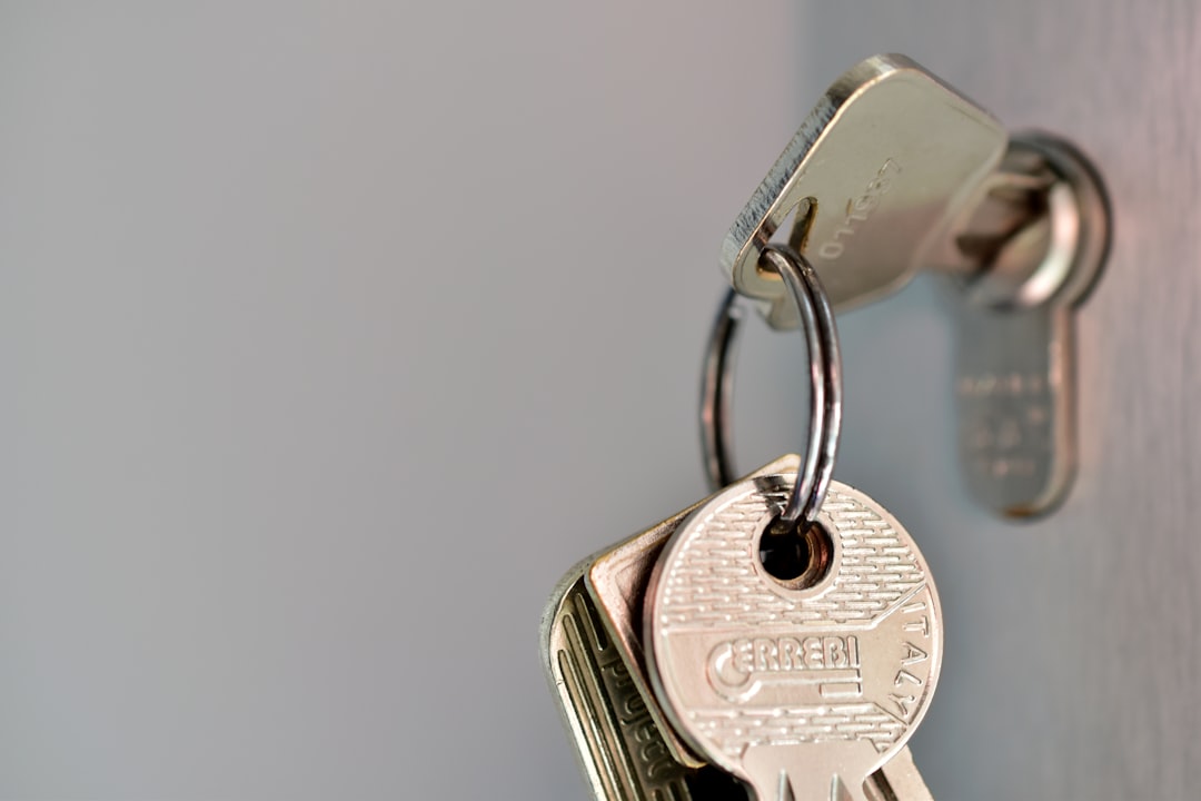 Bunch of keys hanging in a door lock